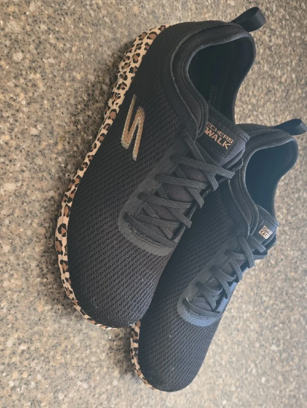 Skechers Women's Black Sneakers with Leopard Heel Accent